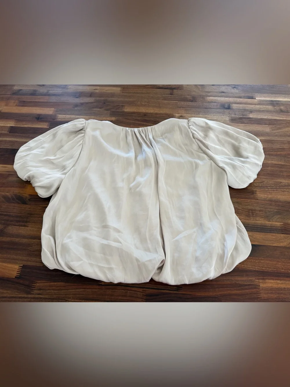 ASTR Champagne Cream Bubble-Hem Pleated V-Neck Blouse